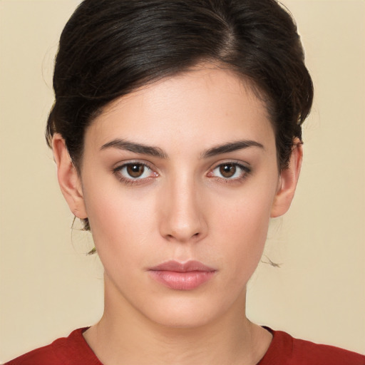 Neutral white young-adult female with medium  brown hair and brown eyes