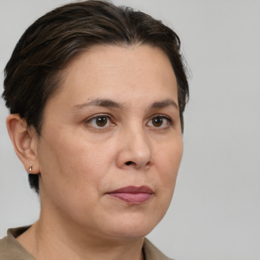 Neutral white young-adult female with short  brown hair and brown eyes