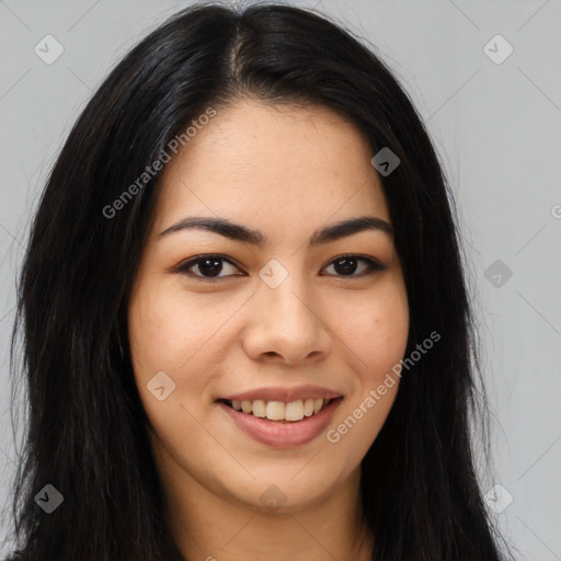 Joyful asian young-adult female with long  brown hair and brown eyes