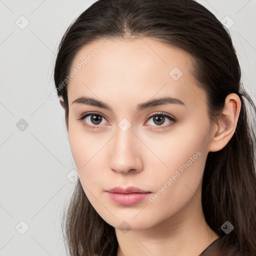 Neutral white young-adult female with long  brown hair and brown eyes