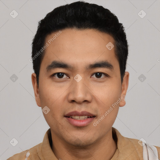 Joyful asian young-adult male with short  black hair and brown eyes