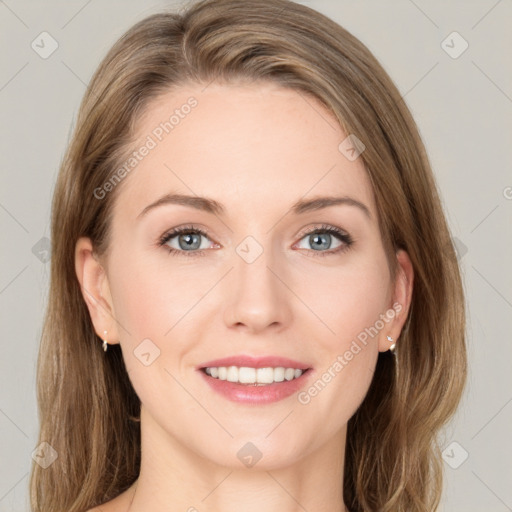 Joyful white young-adult female with long  brown hair and grey eyes