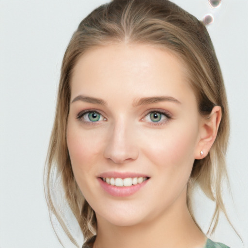 Joyful white young-adult female with medium  brown hair and blue eyes