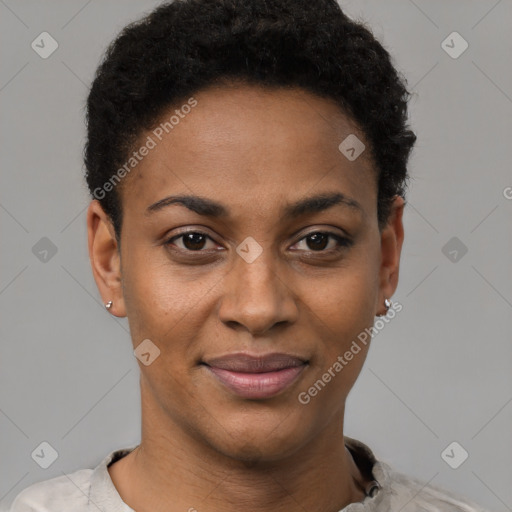 Joyful black young-adult female with short  black hair and brown eyes