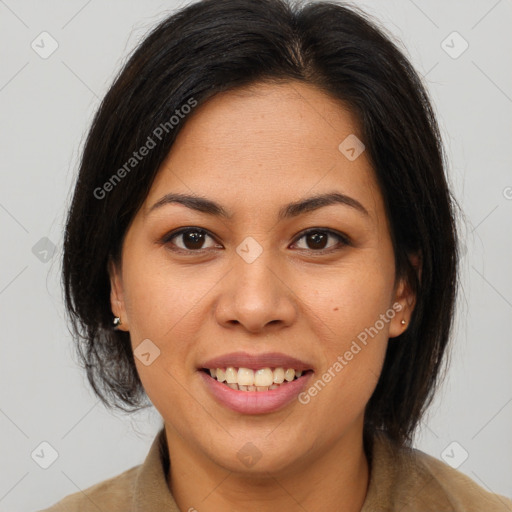 Joyful latino young-adult female with medium  brown hair and brown eyes