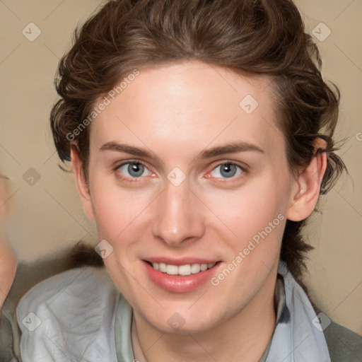 Joyful white young-adult female with medium  brown hair and blue eyes