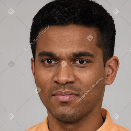 Neutral latino young-adult male with short  black hair and brown eyes