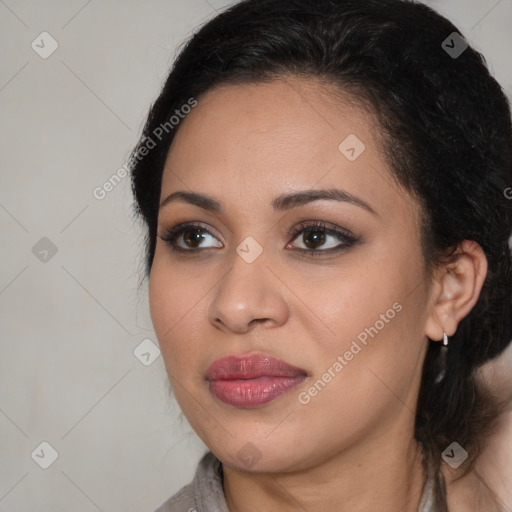 Joyful latino young-adult female with medium  brown hair and brown eyes