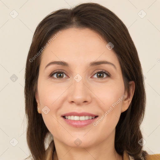 Joyful white young-adult female with long  brown hair and brown eyes