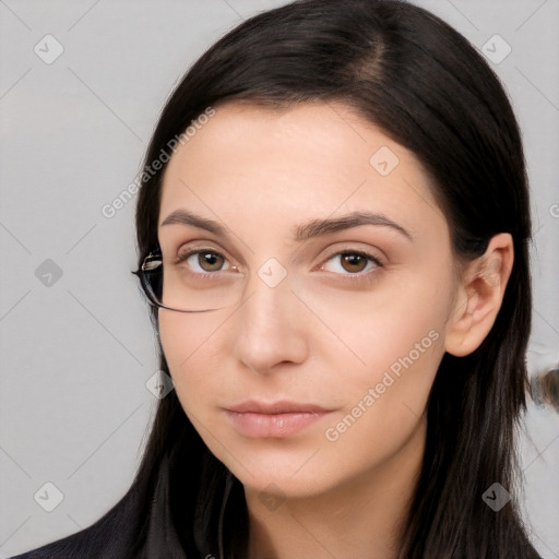 Neutral white young-adult female with long  brown hair and brown eyes