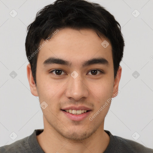 Joyful latino young-adult male with short  brown hair and brown eyes