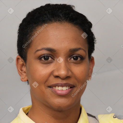 Joyful black young-adult female with short  brown hair and brown eyes