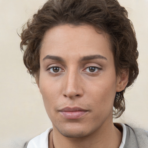 Neutral white young-adult female with short  brown hair and brown eyes