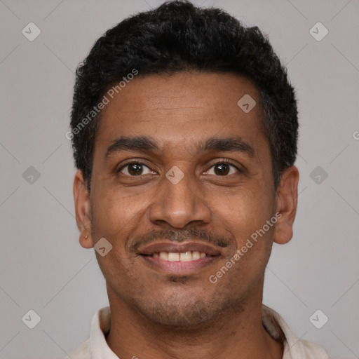 Joyful latino young-adult male with short  black hair and brown eyes