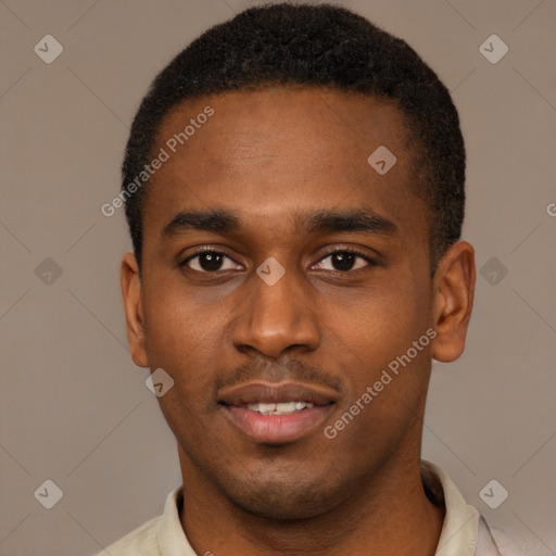Joyful black young-adult male with short  brown hair and brown eyes