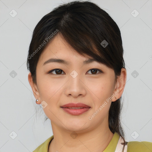 Joyful asian young-adult female with medium  brown hair and brown eyes