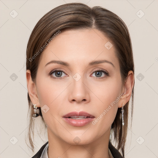 Joyful white young-adult female with medium  brown hair and grey eyes