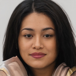 Joyful asian young-adult female with long  brown hair and brown eyes