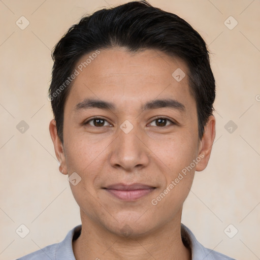 Joyful white young-adult male with short  black hair and brown eyes