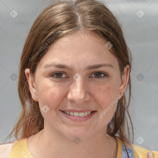 Joyful white young-adult female with medium  brown hair and grey eyes