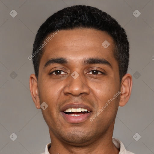 Joyful black young-adult male with short  black hair and brown eyes