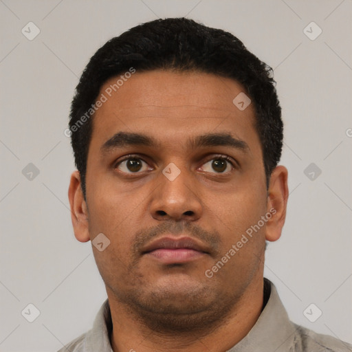 Neutral latino young-adult male with short  black hair and brown eyes