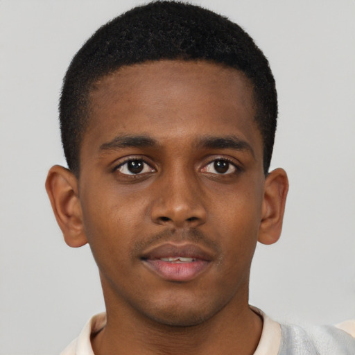 Neutral black young-adult male with short  brown hair and brown eyes