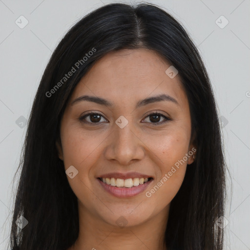 Joyful latino young-adult female with long  brown hair and brown eyes