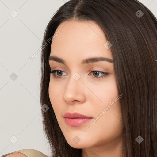 Neutral white young-adult female with long  brown hair and brown eyes