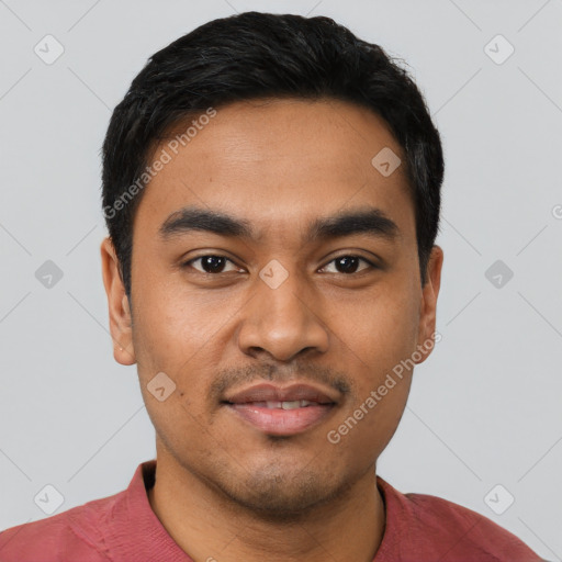 Joyful latino young-adult male with short  black hair and brown eyes