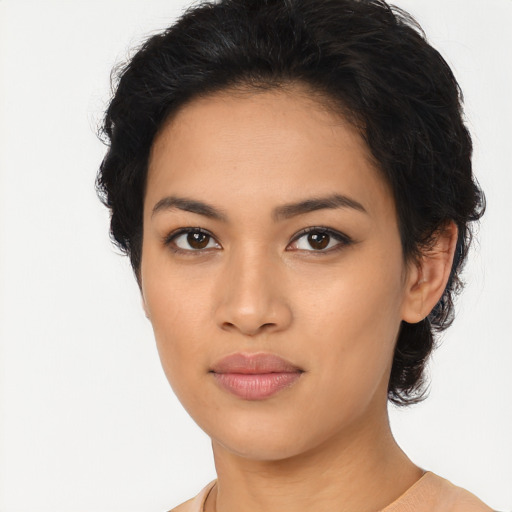 Joyful asian young-adult female with long  black hair and brown eyes