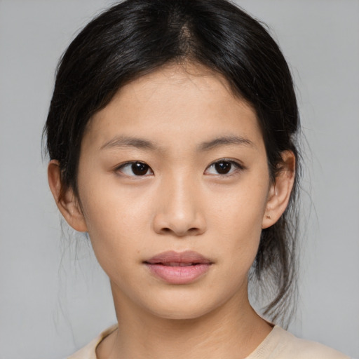 Neutral asian young-adult female with medium  brown hair and brown eyes