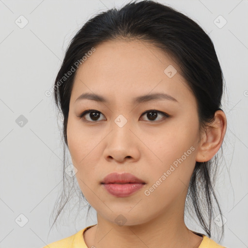 Neutral asian young-adult female with medium  black hair and brown eyes