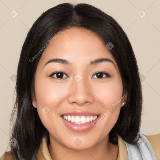 Joyful asian young-adult female with medium  brown hair and brown eyes