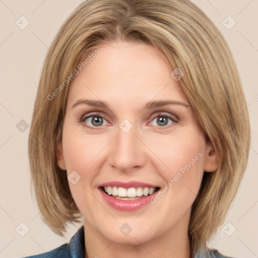 Joyful white young-adult female with medium  brown hair and green eyes