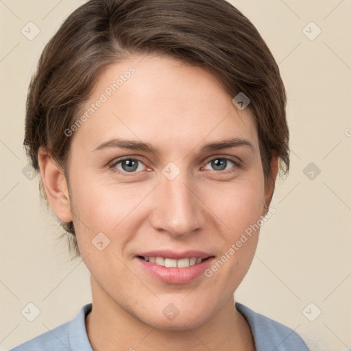 Joyful white young-adult female with short  brown hair and grey eyes