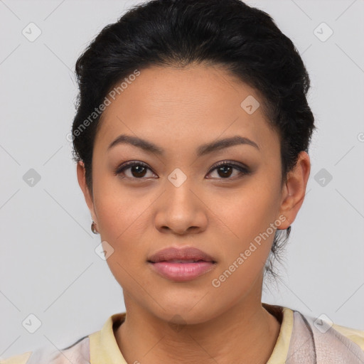 Joyful latino young-adult female with short  black hair and brown eyes