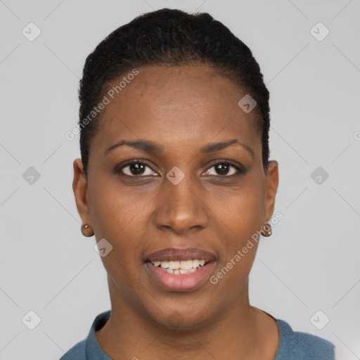 Joyful black young-adult female with short  black hair and brown eyes