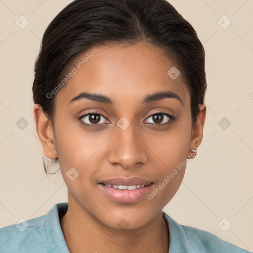 Joyful latino young-adult female with short  brown hair and brown eyes