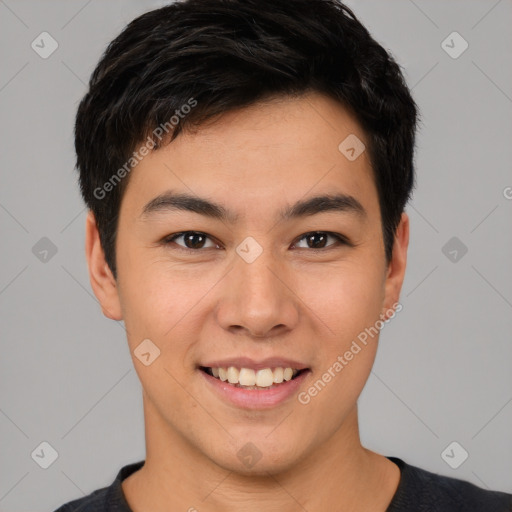 Joyful white young-adult male with short  black hair and brown eyes