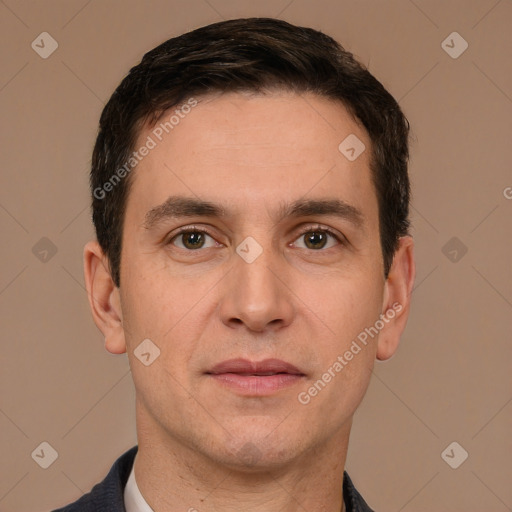 Joyful white adult male with short  brown hair and brown eyes