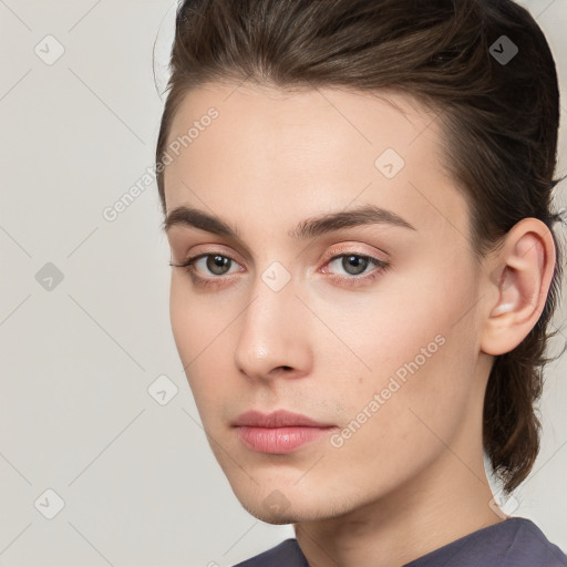 Neutral white young-adult female with medium  brown hair and brown eyes