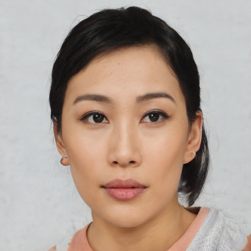 Neutral asian young-adult female with medium  black hair and brown eyes