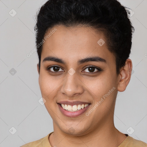 Joyful latino young-adult female with short  brown hair and brown eyes