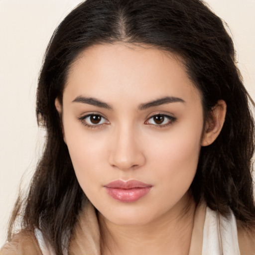 Neutral white young-adult female with long  brown hair and brown eyes