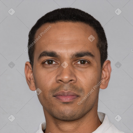 Neutral latino young-adult male with short  black hair and brown eyes