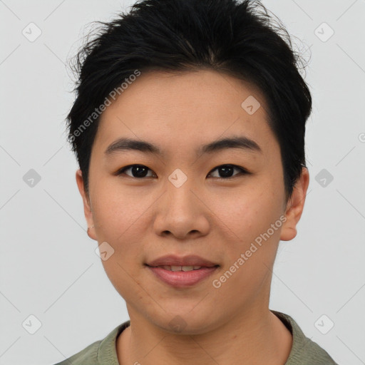 Joyful asian young-adult female with short  black hair and brown eyes