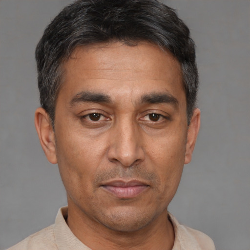 Neutral white adult male with short  brown hair and brown eyes