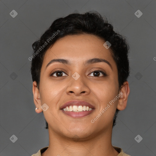 Joyful latino young-adult female with short  brown hair and brown eyes