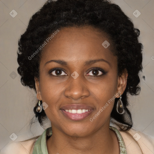 Joyful black young-adult female with long  black hair and brown eyes